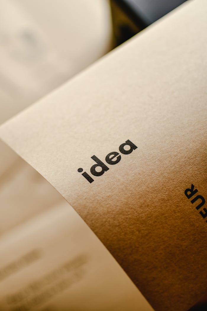 Mastering the First Impression: Your intriguing post title goes here Close-up shot of the word 'idea' printed on brown paper, perfect for representing creativity and startups.